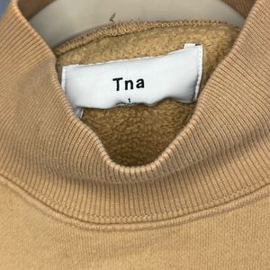 Women’s beige TNA mock neck size 1 (small)